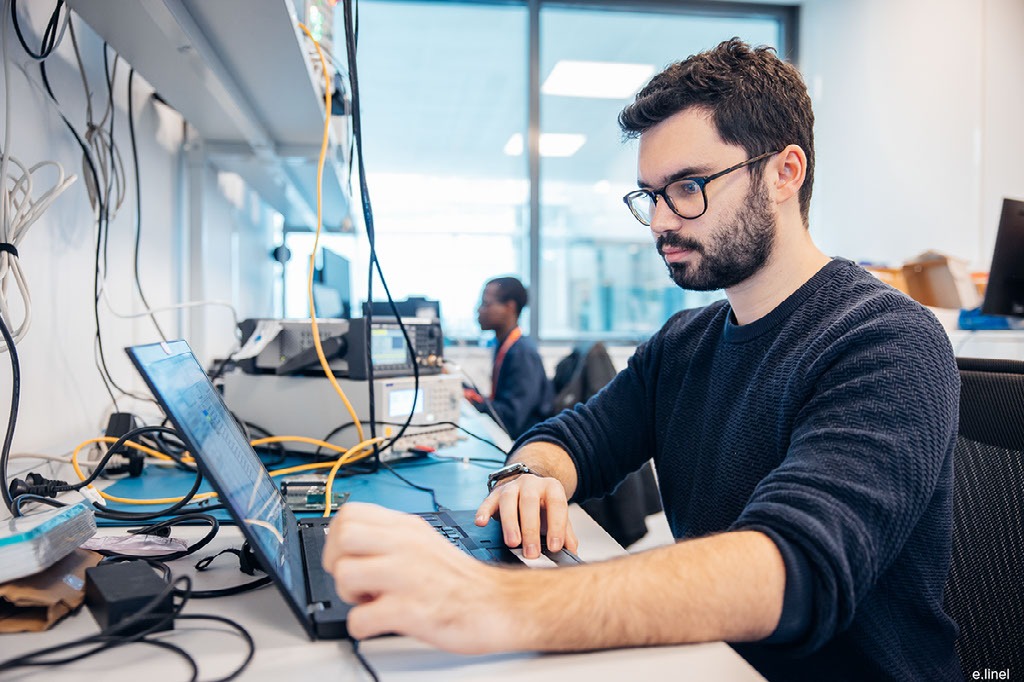 Viveris team members working in modern office